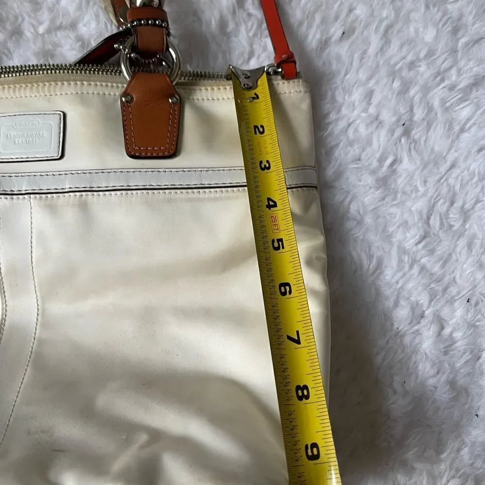 Coach Hampton Beige satin and orange accents satchel with silver tone hardwares